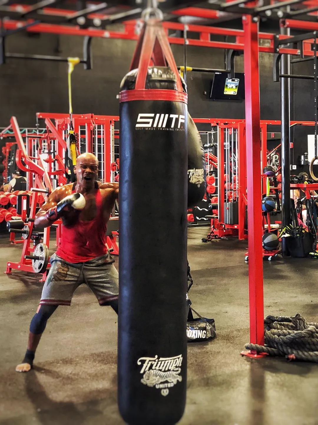 Coach Bizz working the heavy bag