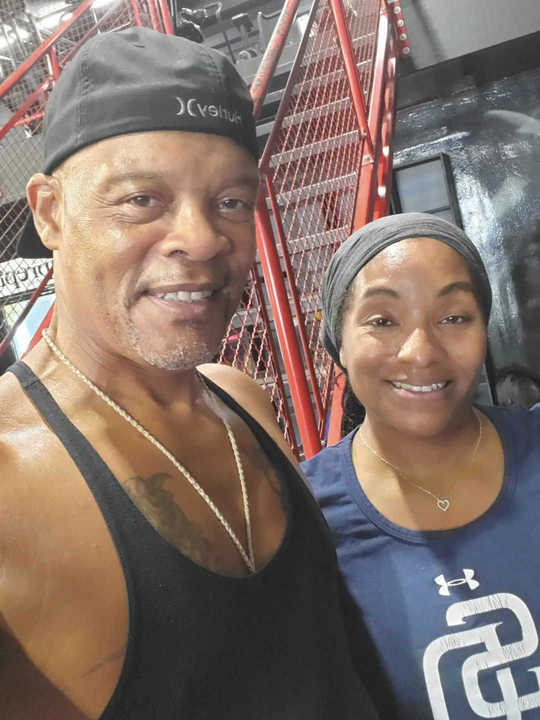 Coach Bizz with a client after their session