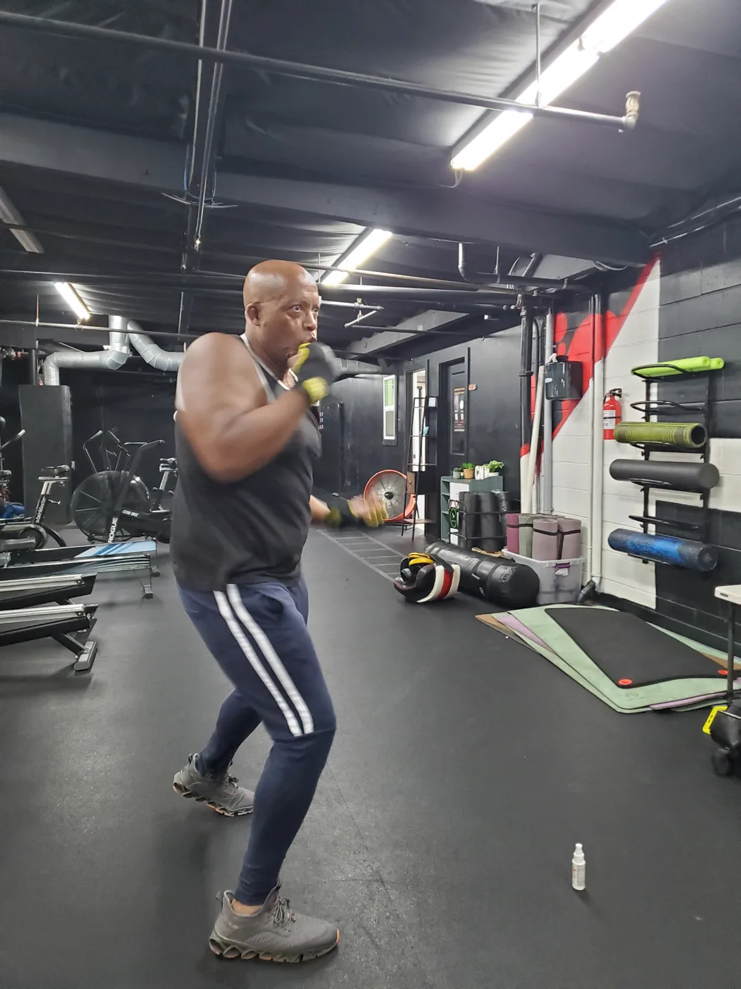 Coach Bizz shadowboxing during a training session